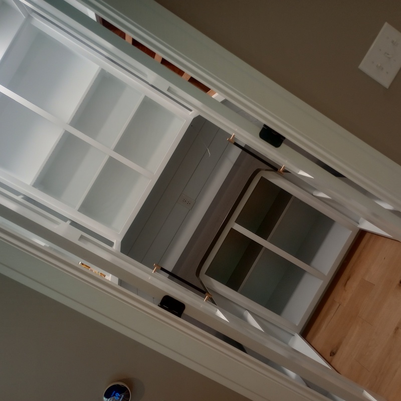 Custom made pantry shelving, cabinets, and doors